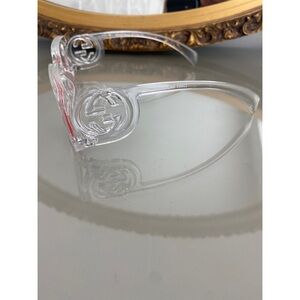 Clear glasses with pink tinted lens